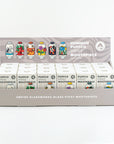 Assorted Puffco Pivot Mouthpieces by Empire Glassworks shown in retail packaging with included display stand.