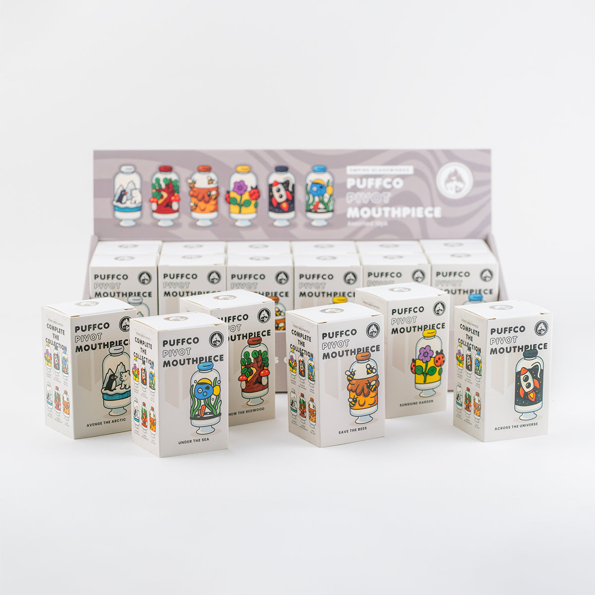 Wholesale 18-piece case of Empire Glassworks Puffco Pivot Mouthpieces with countertop retail display featuring assorted designs.