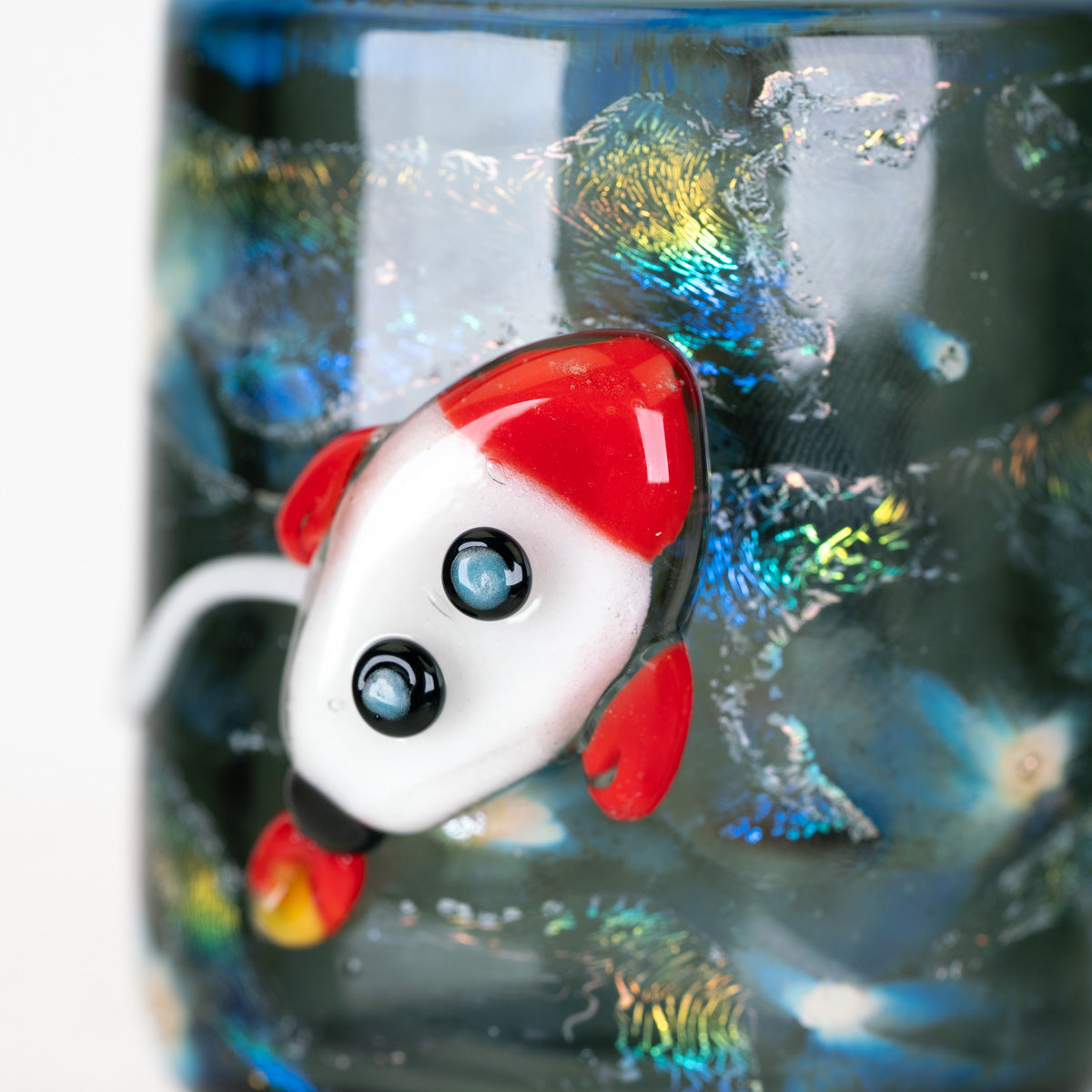 Puffco Proxy Core glass attachment by Empire Glassworks with vibrant cosmic colors and a dimensional white character