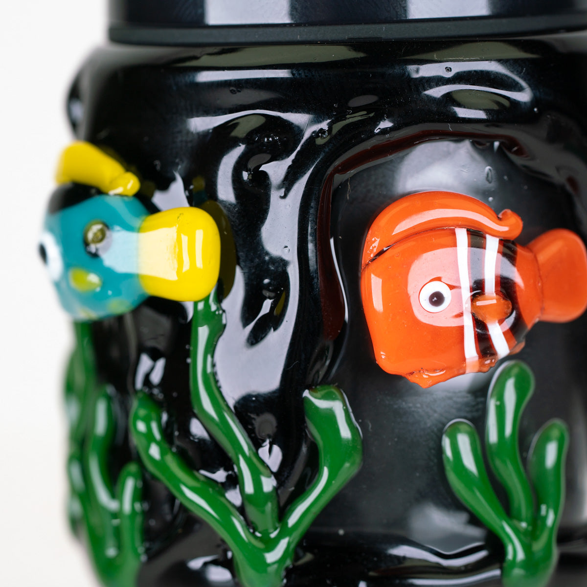 Close-up of Under the Sea Proxy Core attachment showing detailed orange clownfish and underwater lampwork