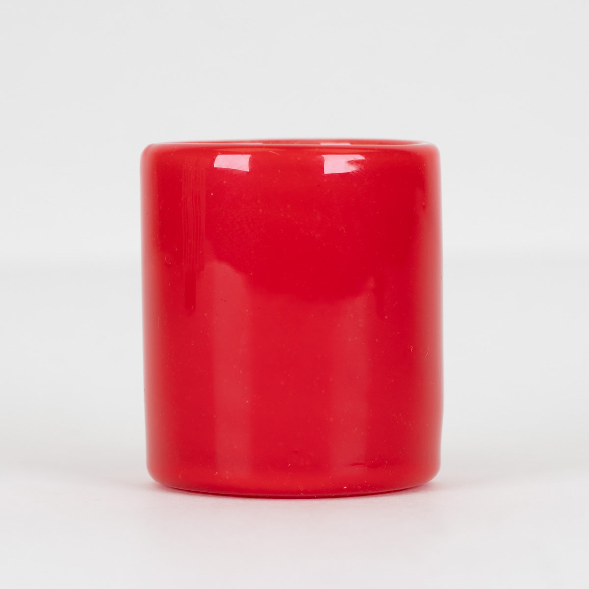 Close-up of Sriracha Sauce Proxy Core attachment featuring white bottle-style graphics on vibrant red glass